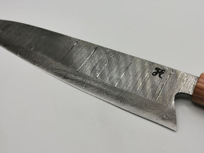 Détail lame damas signature H gravée talon couteau de chef Le Meunier