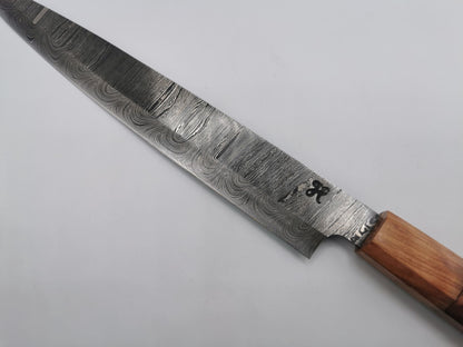 Talon de lame et poinçon du forgeron Hosteel sur le couteau de chef Le Valensola, jonction entre l'acier damas et le manche en bois
