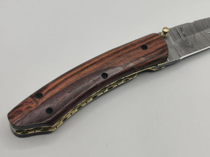 Manche zébrano et dos platine laiton ciselé couteau collection Le Baou