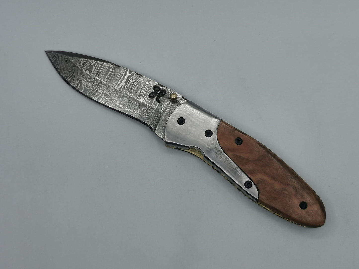 Couteau de poche pliant Le Pagnol en acier damas, manche bois d'olivier et inox – Hosteel Coutellerie
